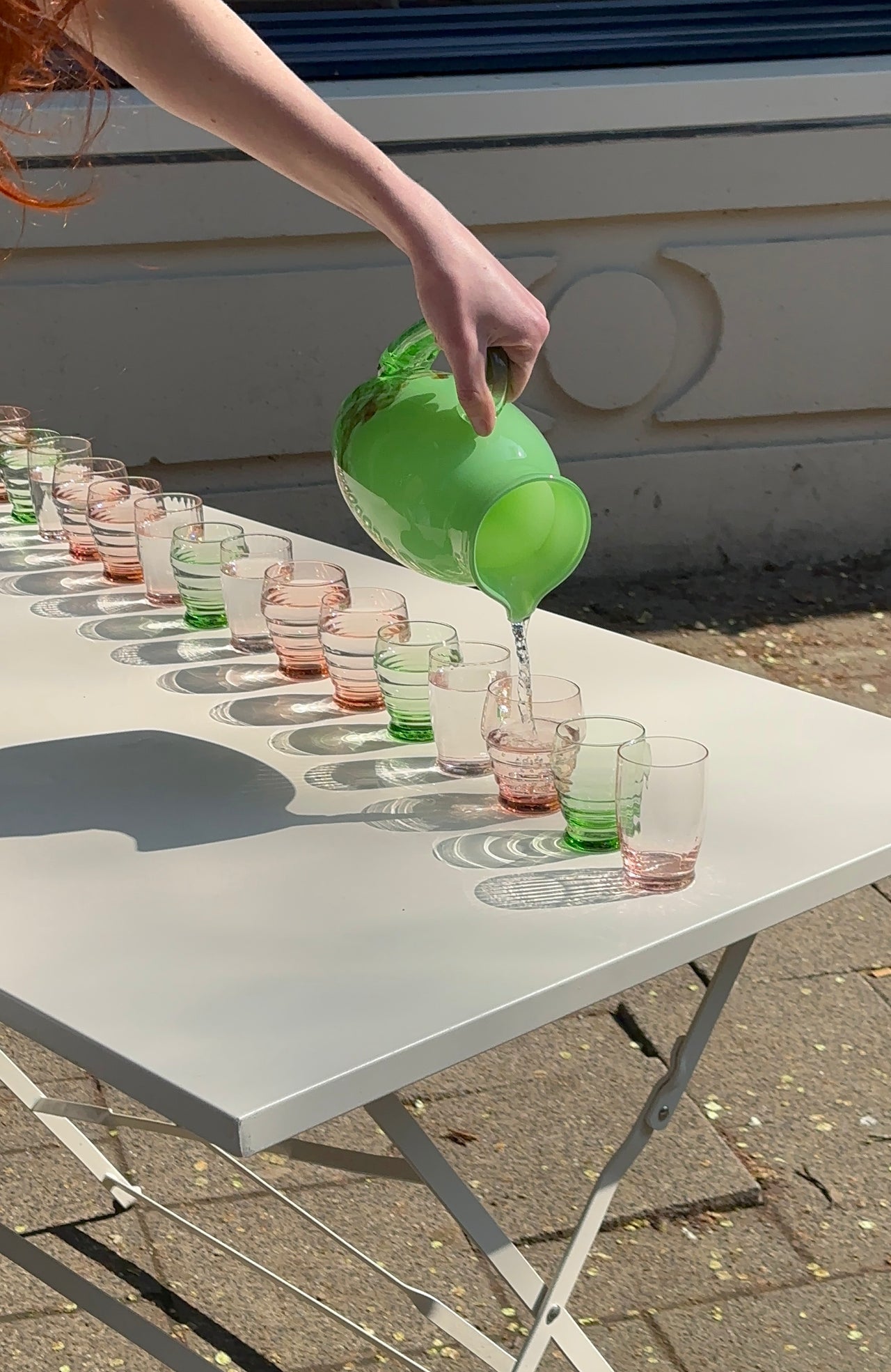 Handblown green pitcher