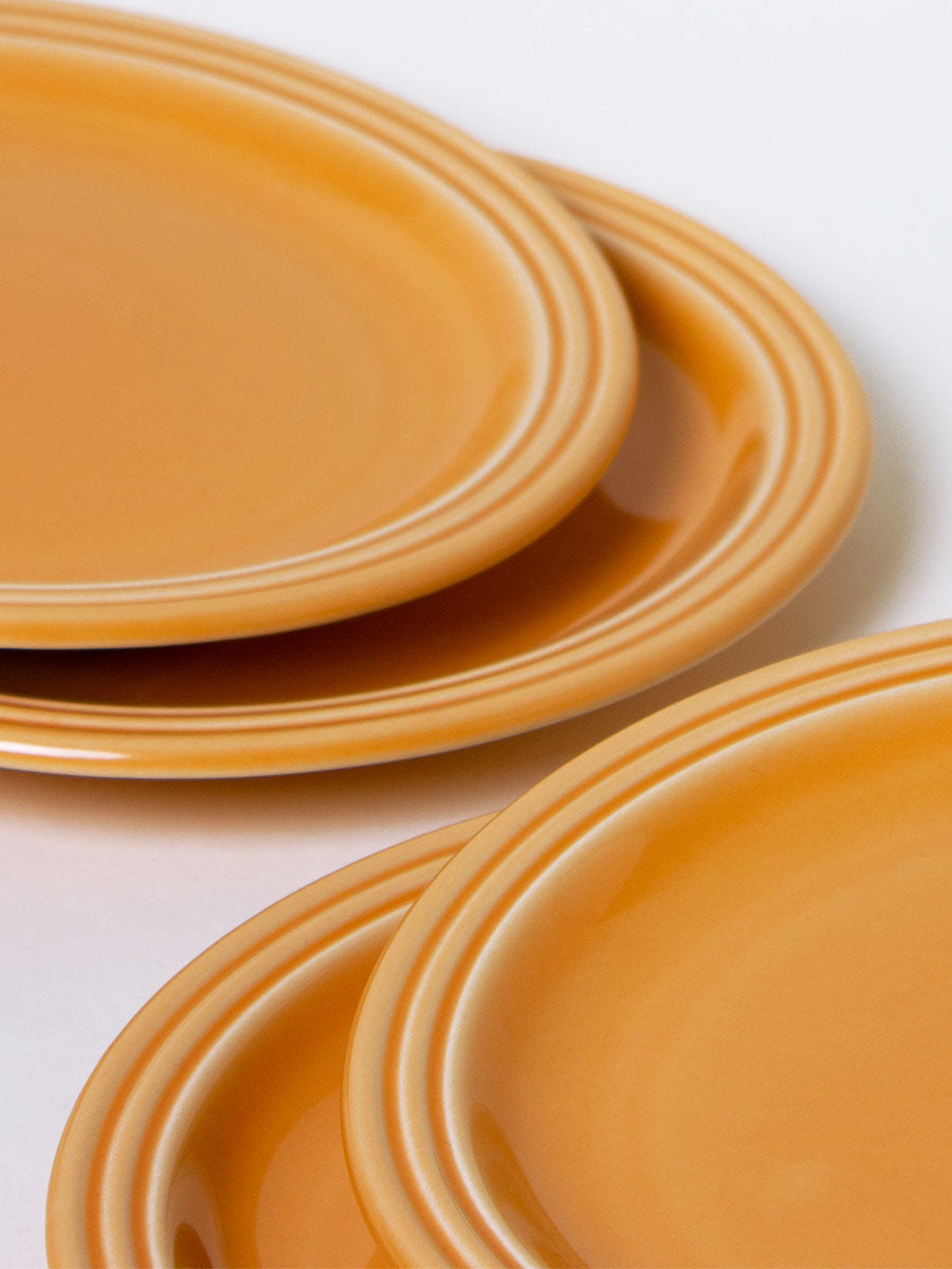 Set of 4 orange lunch plates