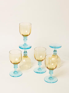 Set of small blue and yellow wine glasses