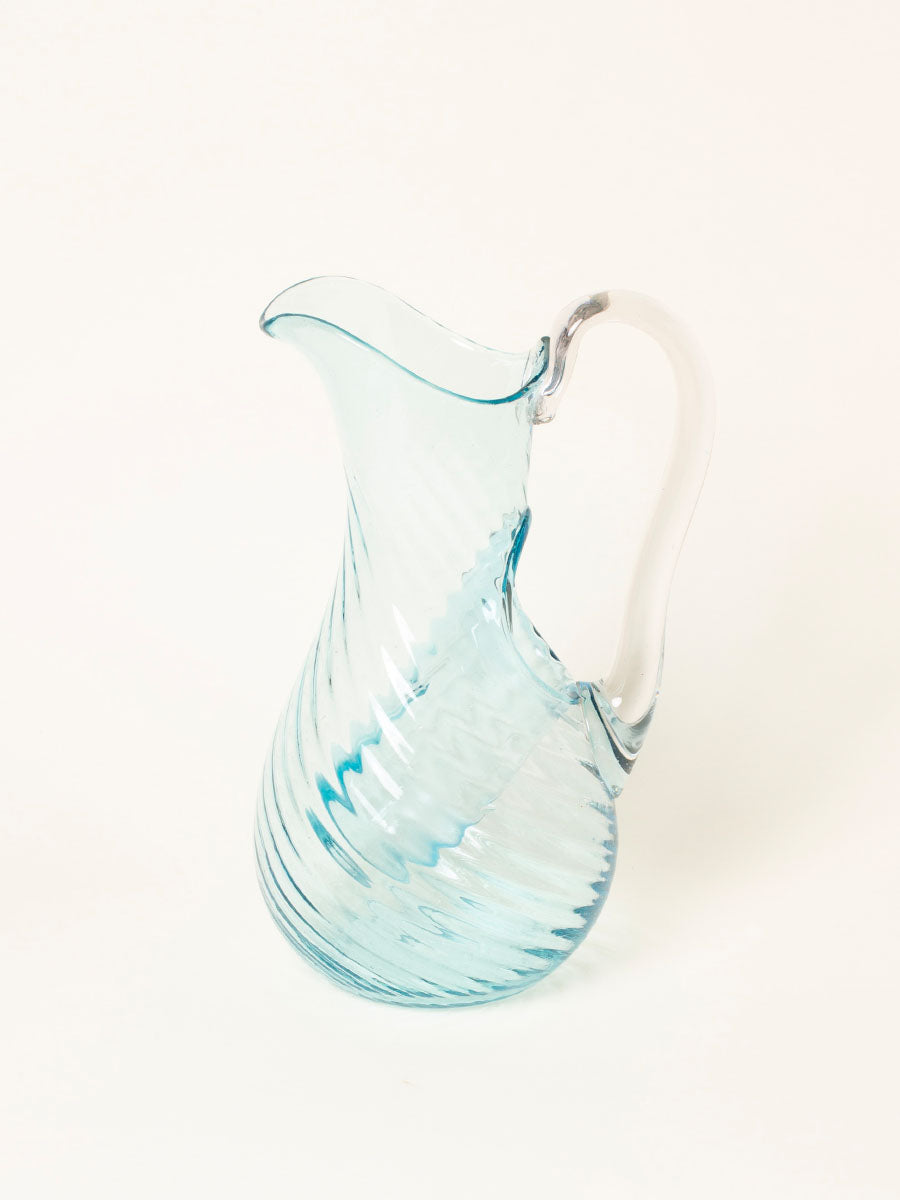 Blue pitcher with ice-catch