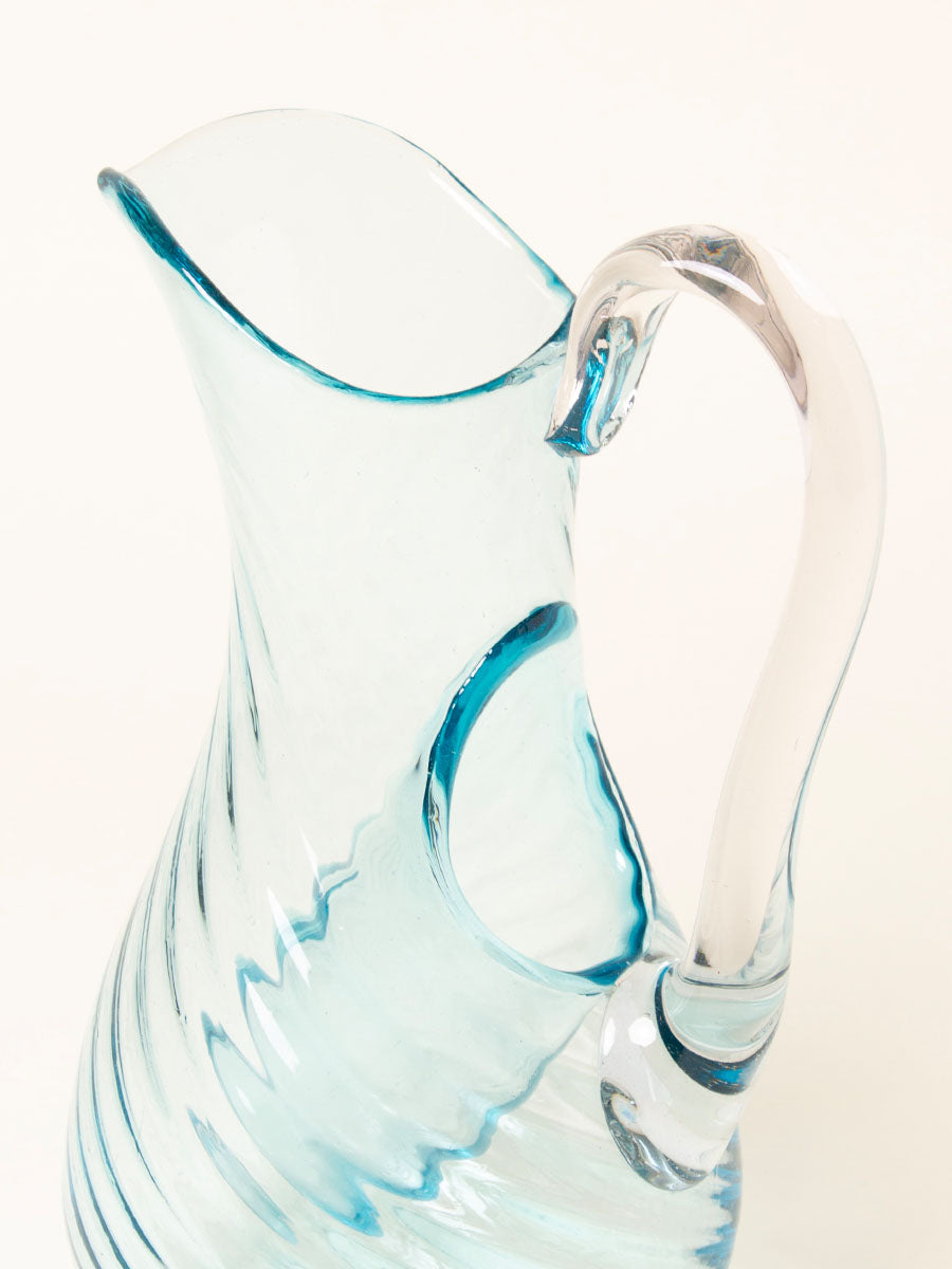 Blue pitcher with ice-catch