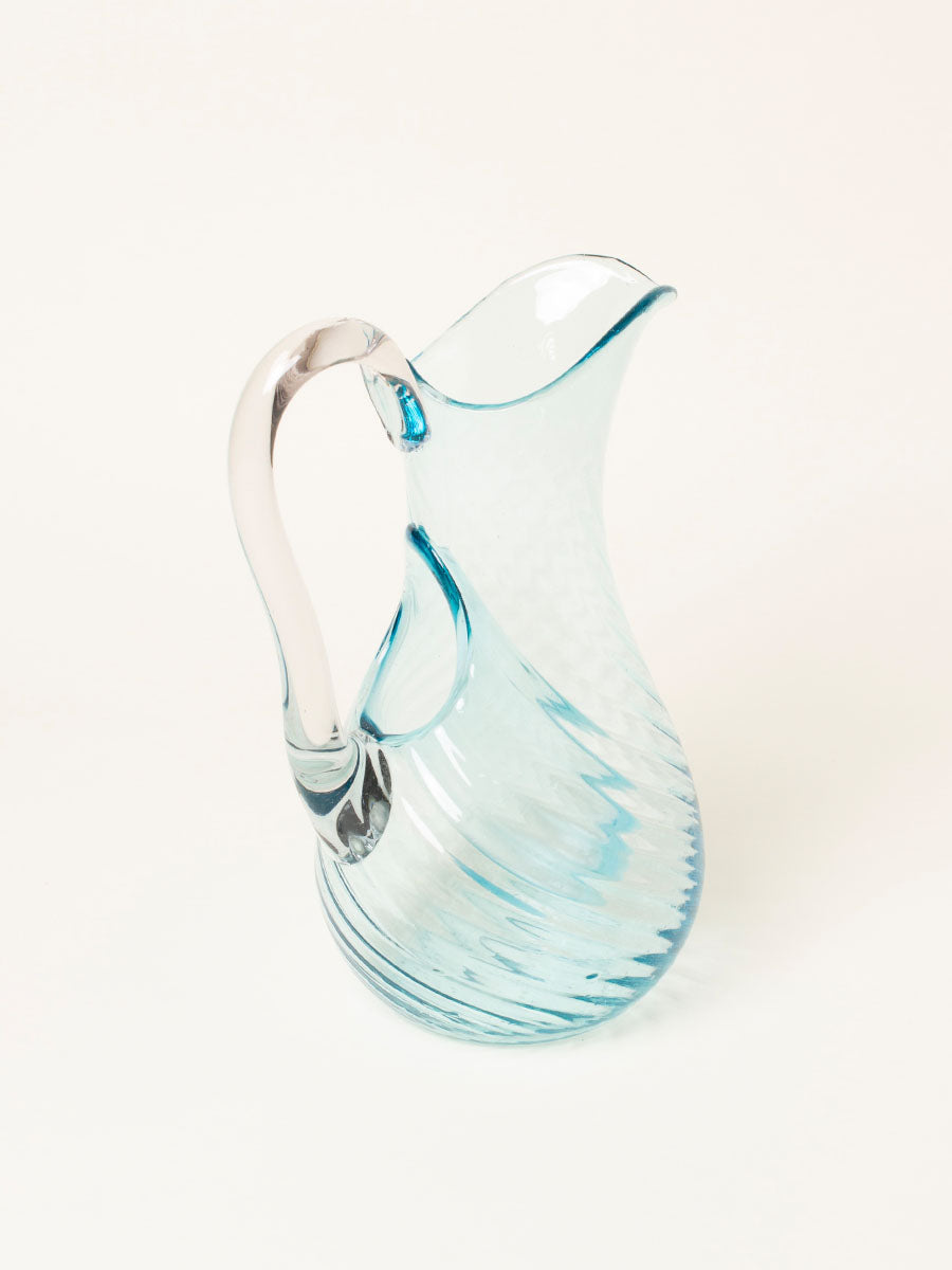 Blue pitcher with ice-catch