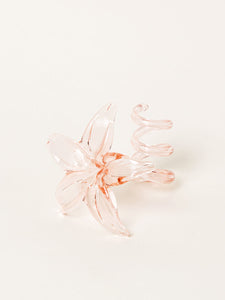 Pink flower-shaped glass candleholder