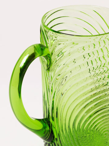 Green pitcher with circles