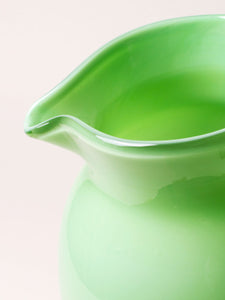 Handblown green pitcher