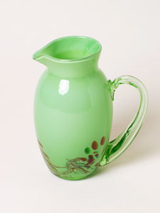 Handblown green pitcher