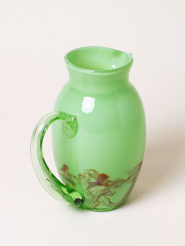 Handblown green pitcher