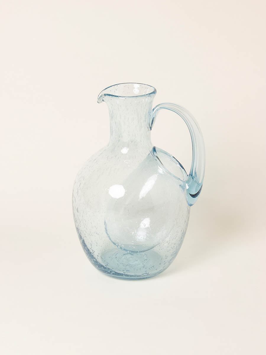 Blue bubble pitcher with ice catch