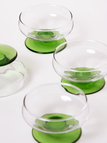 Set of 4 glass bowls with green base