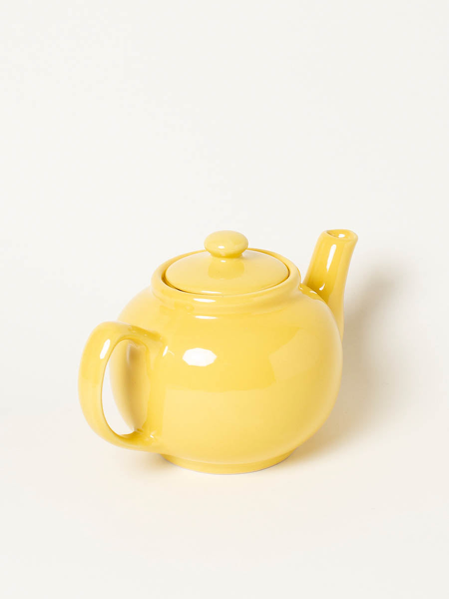 Yellow ceramic teapot